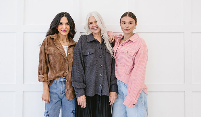 Three Women In Jeans And Shirts Standing Together, Showcasing Modest Clothing And Classic Fashion Style