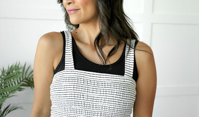 A women striped top in black and white fabric