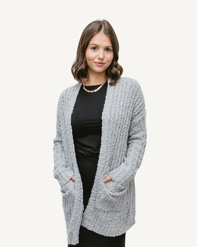 Ribbed popcorn knit long open cardigan in a neutral color, perfect for layering in chilly weather.