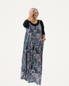 A stylish plus-size dress in a blue and black floral print