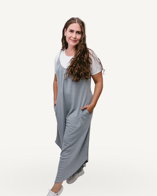 An image of a woman wearing a gray Solid French terry wide-leg jumpsuit.