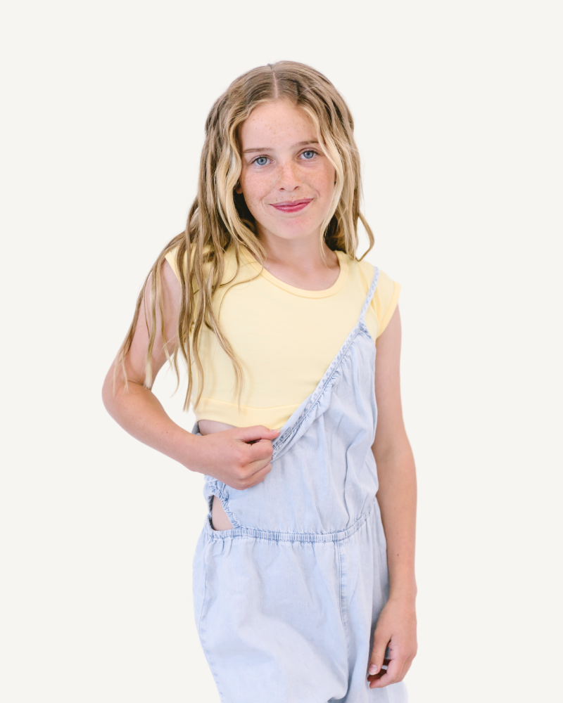 Young girl in yellow and white cat print dress, Girlee Basic Cap Sleeve.