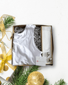 a halftee white shirt and Silver Gift Box