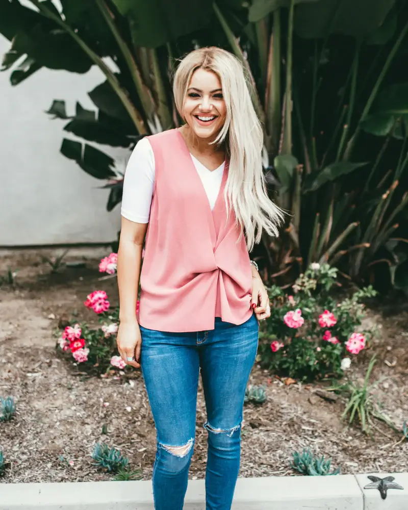 girl wearing pink Elbow Sleeve V-Neck and a jeans