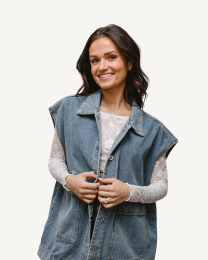 A woman wearing a Full Lace Tank crop top and jeans, showcasing a trendy and casual outfit.