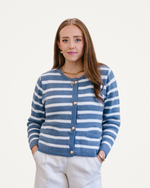 A blue and white striped cardigan sweater