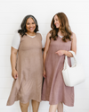 Two woman wearing  taupe maxi dress with a solid V-neck design.