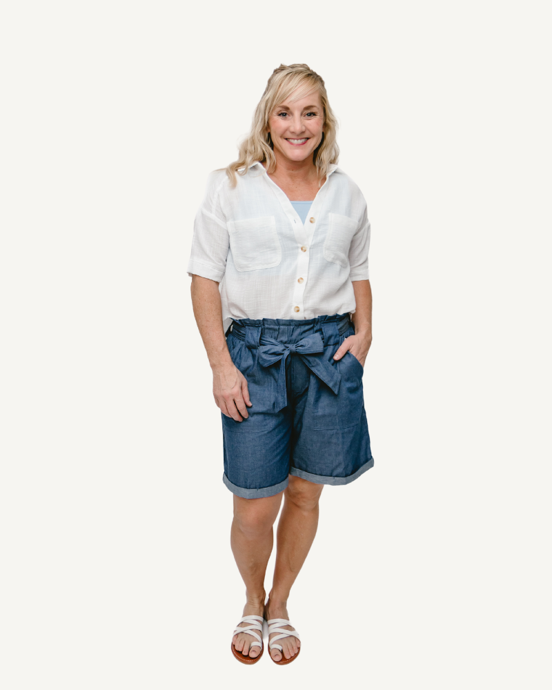 Denim paper bag shorts with a stylish look, perfect for casual outings or a day at the beach.