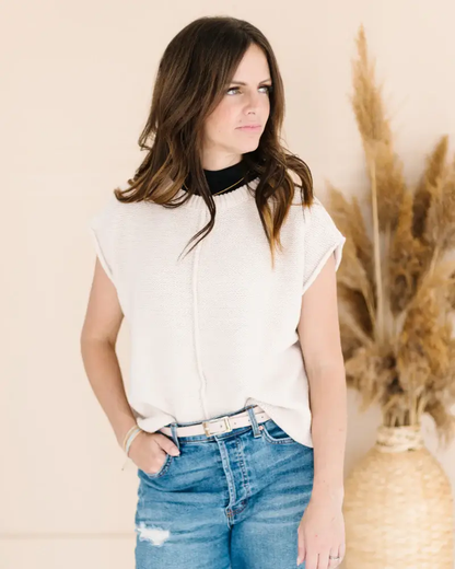 a girl wearing white Mock Neck Sleeveless black and white