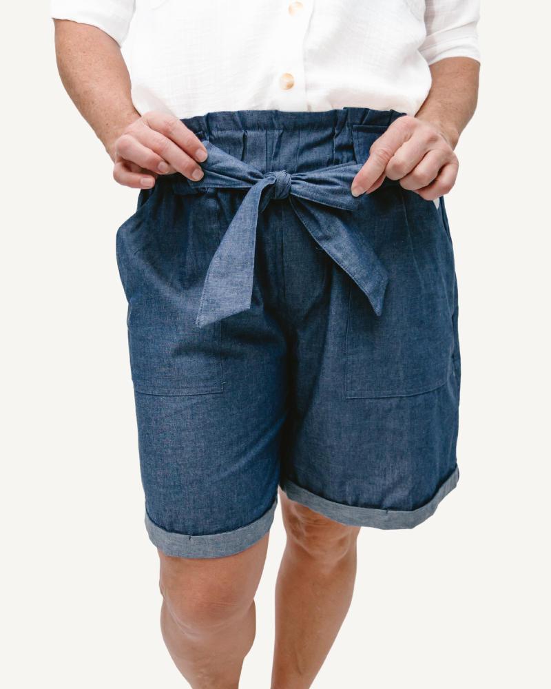 Stay fashionable and comfortable in these denim paper bag shorts, a must-have for your wardrobe.