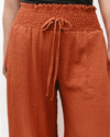 Wide leg linen pants with pockets, part of the Solid French Terry Wide Leg rusty Jumpsuit.