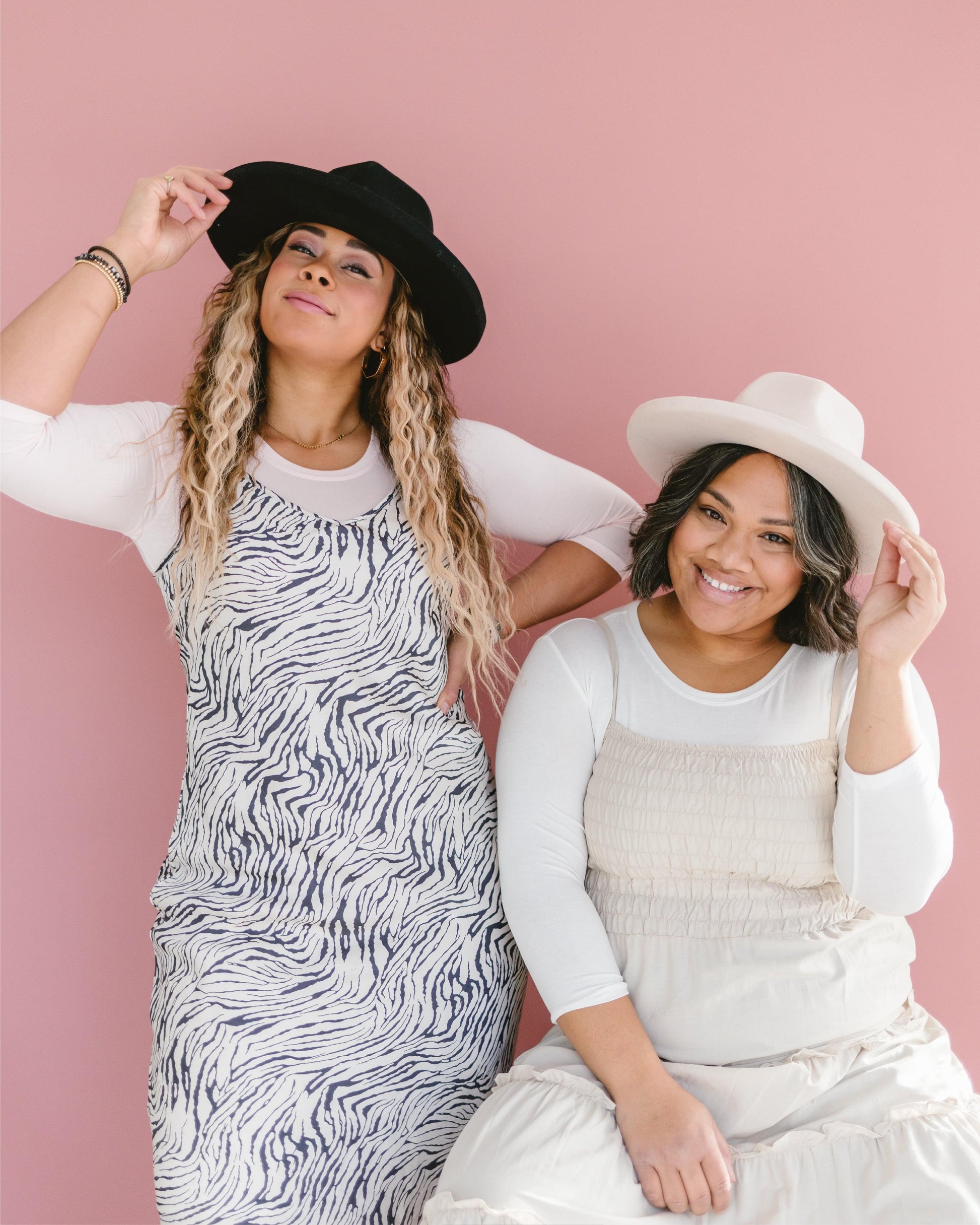 a two girl wearing white dress and printed dress with Crew Neck 3/4 Sleeve