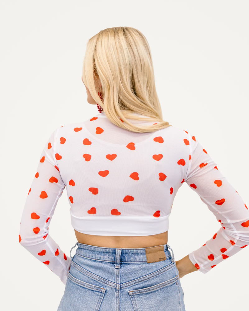 White and red heart print crop top from HALFTEE Layering Fashions, perfect for stylish layering and casual wear.