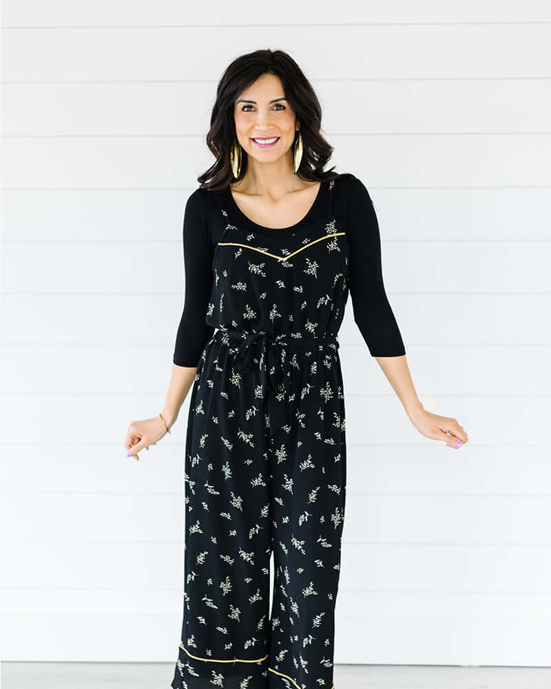 Black floral jumpsuit made from cotton blend with v-neck, long sleeves, and a Classic Three Fourth Sleeve Halftee Black.