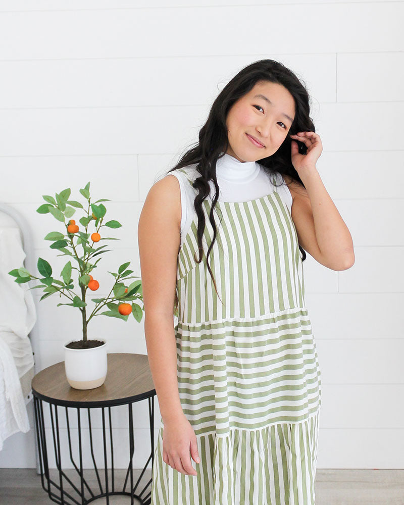 Green striped dress, perfect for summer. Mock Neck Sleeveless Front.
