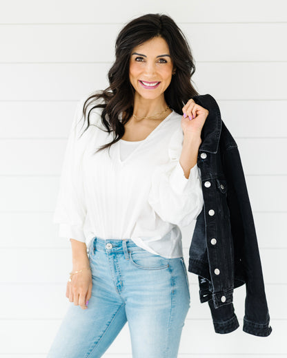 Woman in jeans and white top, wearing Tank Halftee (Rayon/spandex blend).